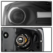 Load image into Gallery viewer, Spyder 04-15 Nissan Titan / 04-07 Nissan Armada V2 Projector Headlights - Black PRO-YD-NTI04-DRL-BK