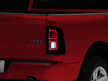 Load image into Gallery viewer, Raxiom 09-18 Dodge RAM 1500 LED Tail Lights- Black Housing (Smoked Lens)